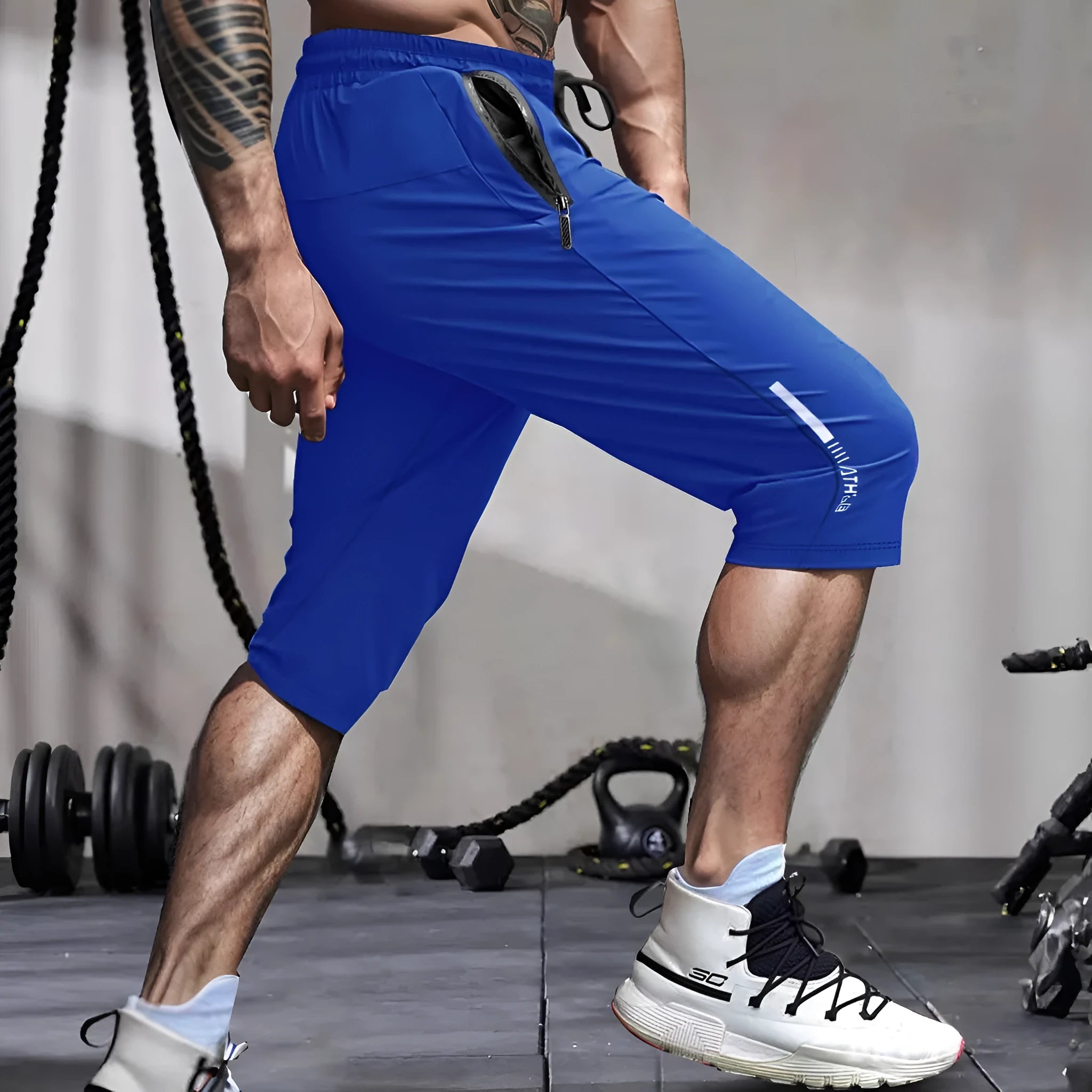 Men's straight-leg cropped sports pants in quick-dry nylon fabric, shown in khaki colour.