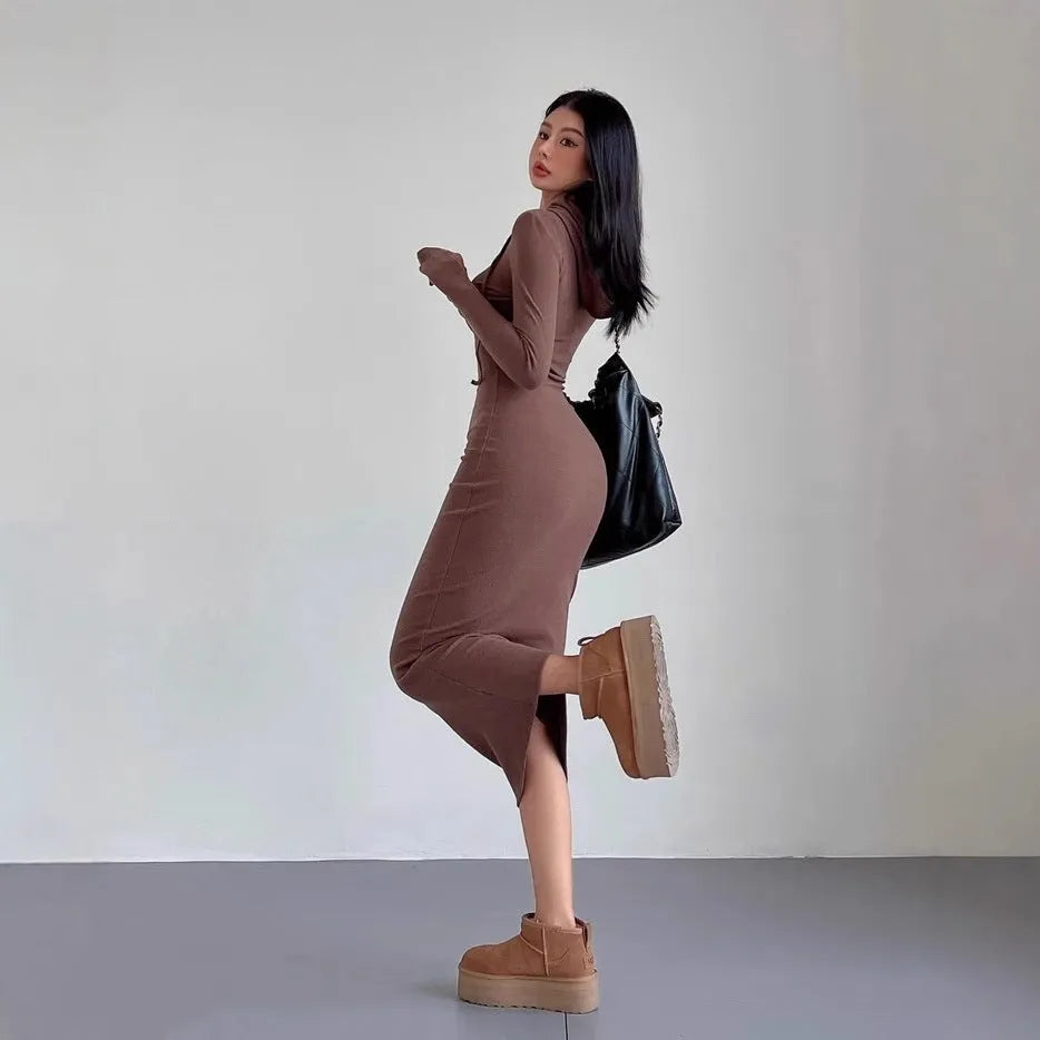 Women's long sleeve hooded sheath dress in grey with over-the-knee length and high waist.