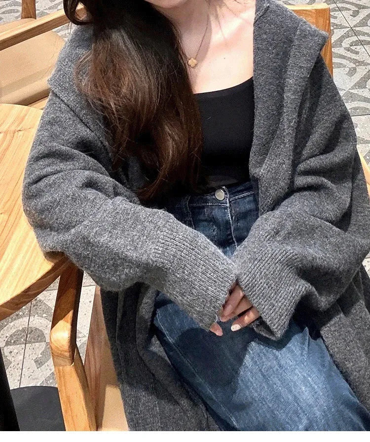 Korean style long hooded knitted cardigan coat for women in a loose free size.