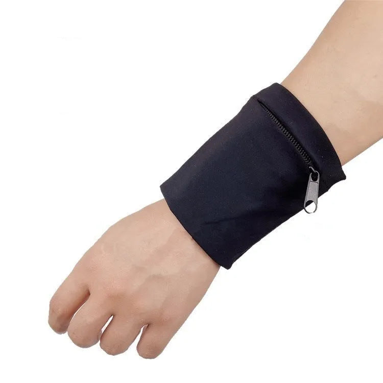 Wrist bag armband sleeve for mobile phone, shown in packaging, dimensions 10 by 10.5 cm.