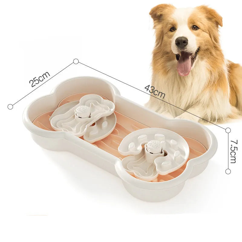 Large green slow feeder dog bowl with three rotating puzzle trays and non-slip suction cups on base