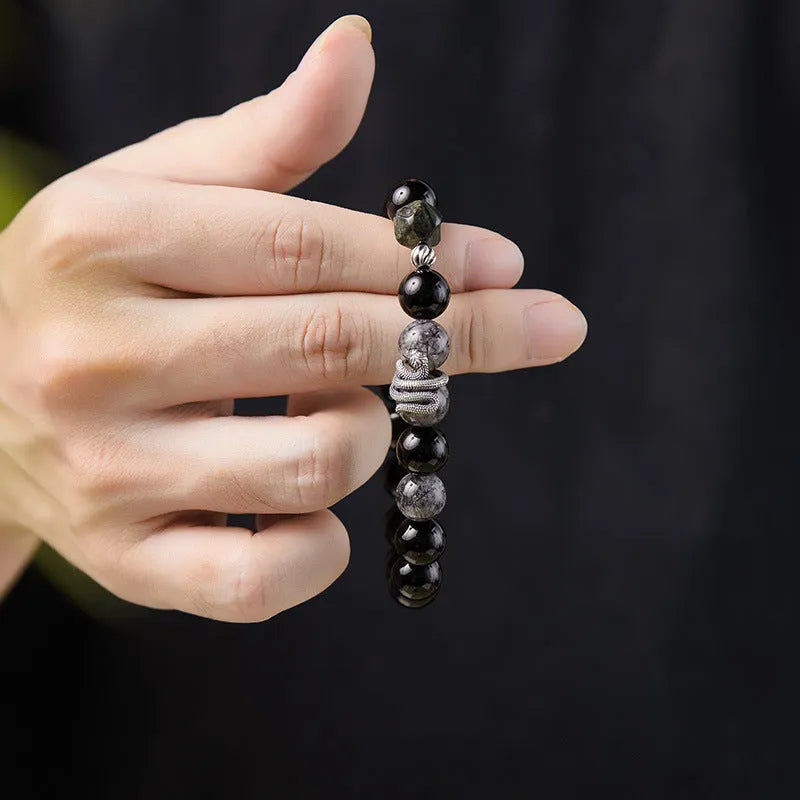 Men's sterling silver bracelet with black obsidian crystal snake charm in retro animal zodiac design
