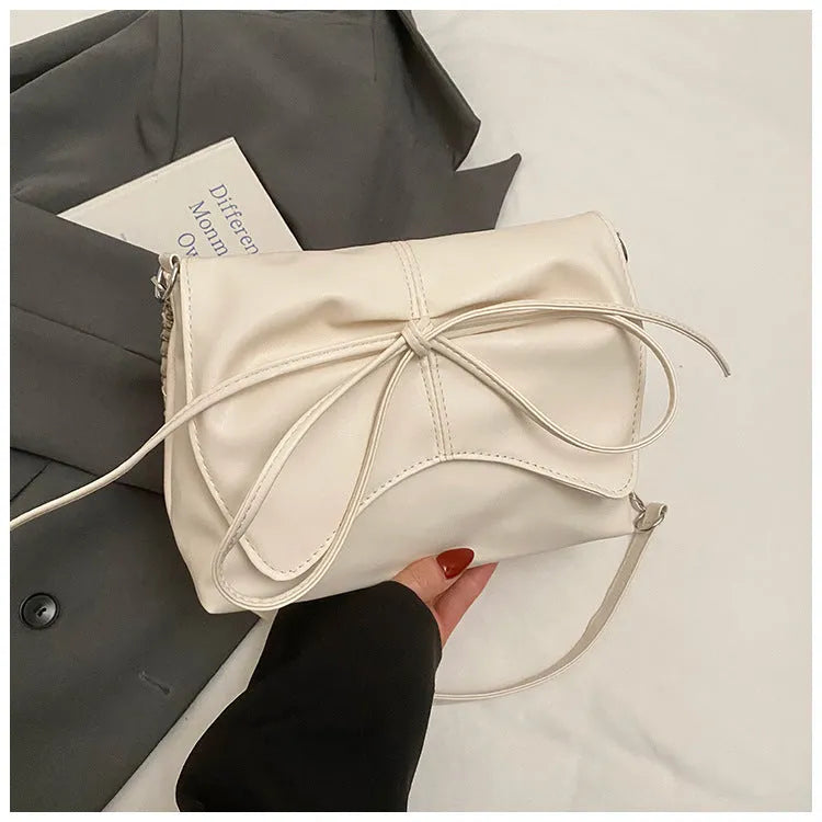 Women's large capacity horizontal square underarm bag in PU material with sewing line details and multiple colour options