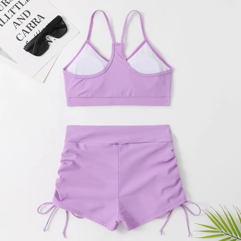 Women's high-waist split swimsuit bikini in purple or black with sleeveless design