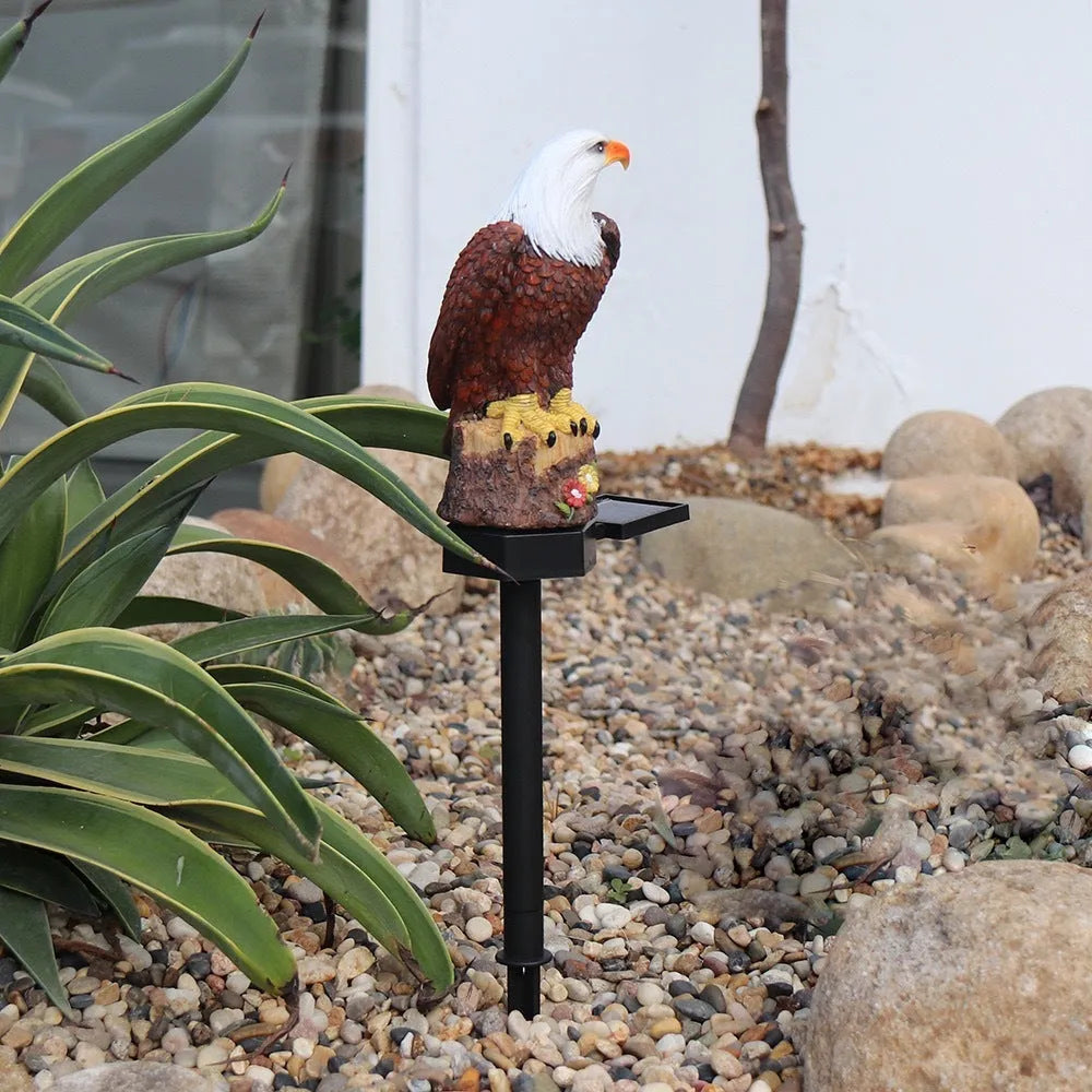 Solar resin eagle lawn lamp in garden setting with IP44 protection, 43.8cm tall