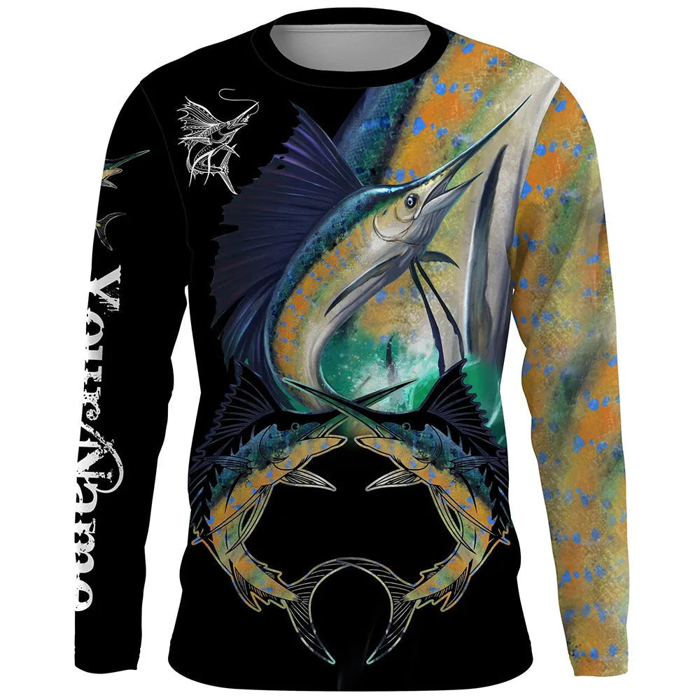 Man wearing a grey pullover with a detailed all-over blue fish print design, round neck, and long sleeves.