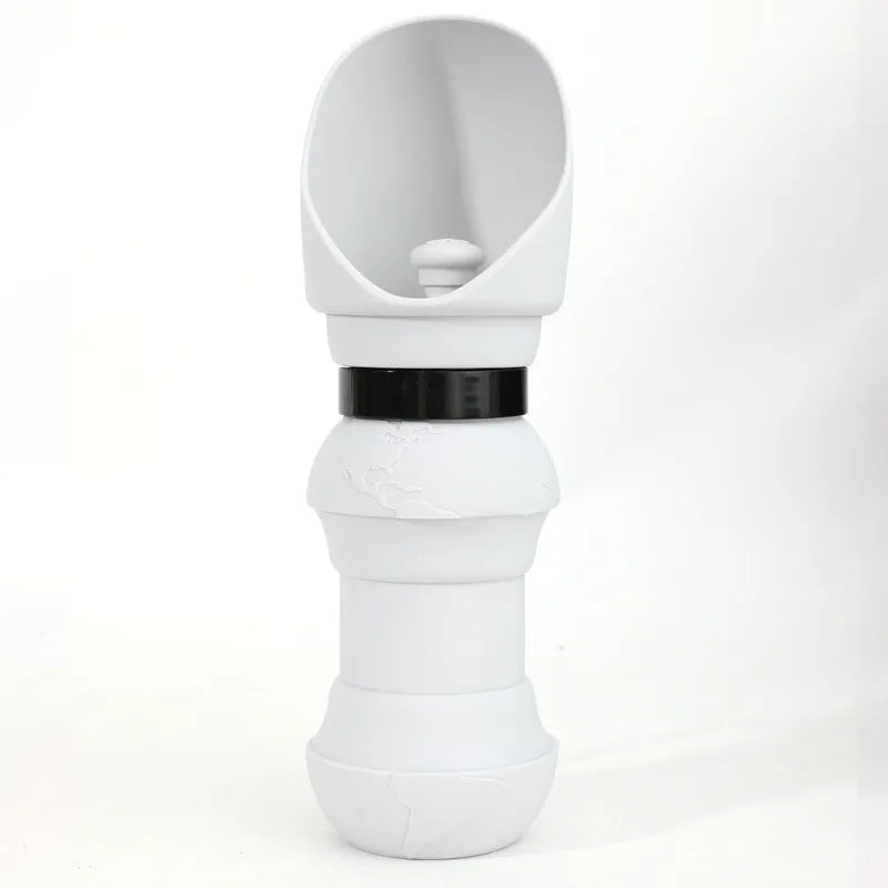 Folded and unfolded silicone pet cup in a choice of colours, showing its portable design.