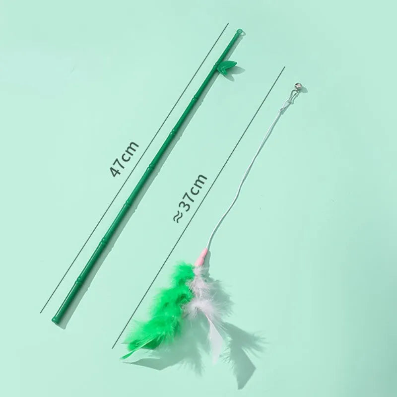 Green interactive cat feather wand toy with bells and synthetic feather attachments