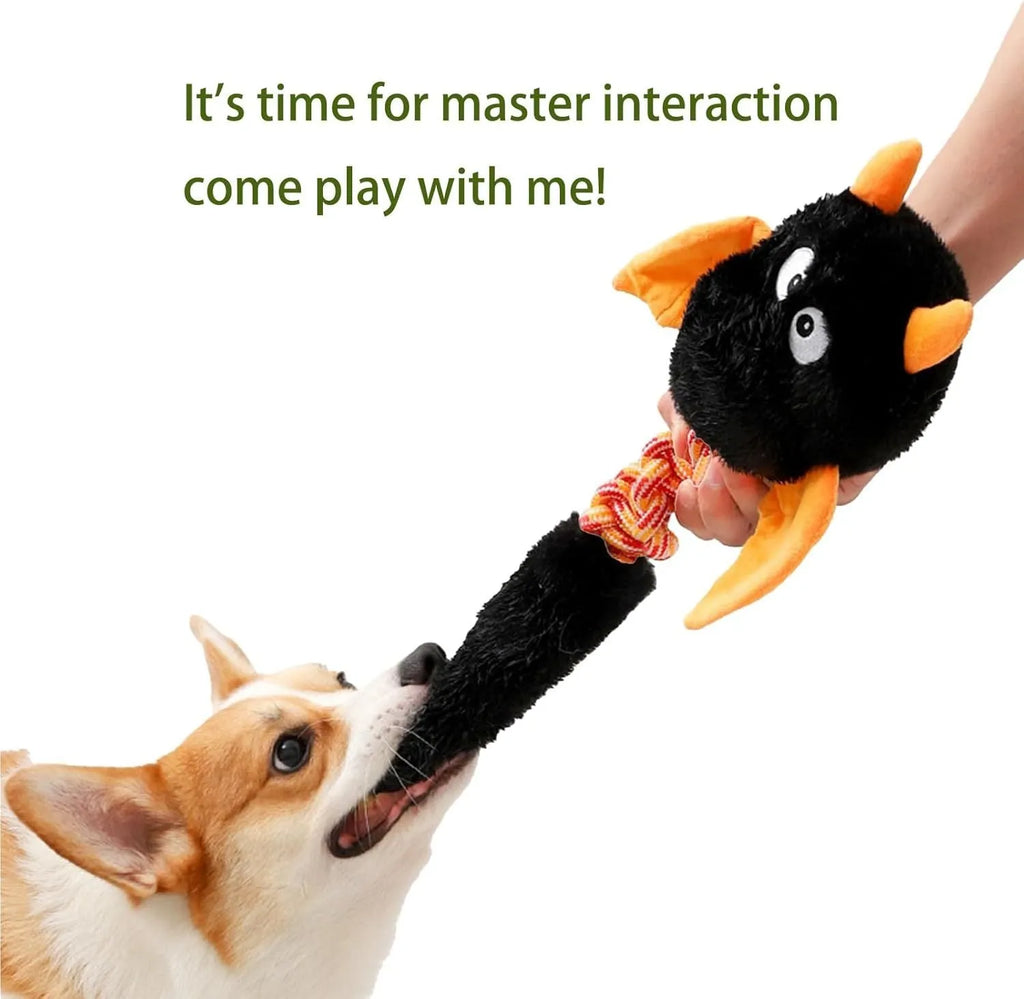 Large black plush dog toy with cartoon design, a rope knot, and a squeaker for chew play.