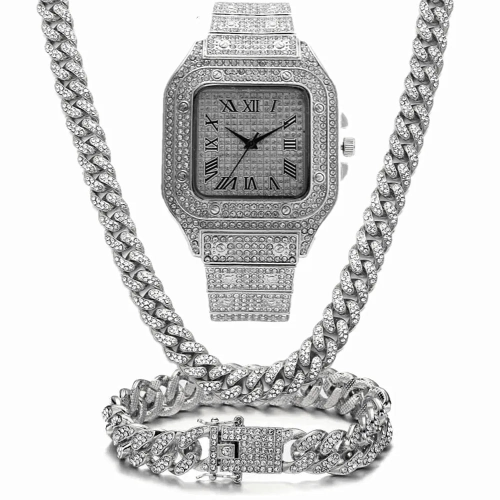 Gold Roman numeral square watch with diamond studs on a mesh band, plus bracelet and necklace.