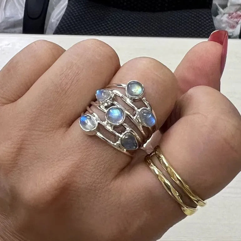 Silver irregular wide band ring for women made of zinc alloy on plain background showing full shape