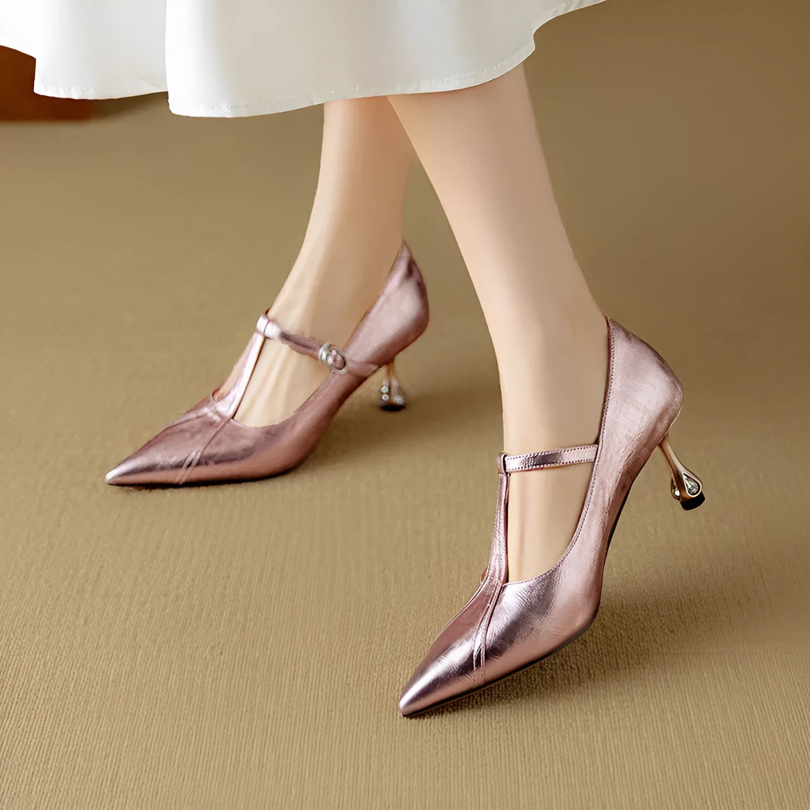 Women's gun colour genuine leather Mary Jane pumps with a chunky heel and pointed toe.