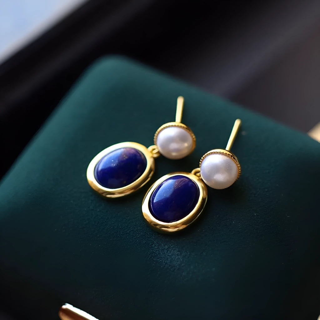 Lapis lazuli pearl drop earrings in sterling silver with auspicious pattern detailing