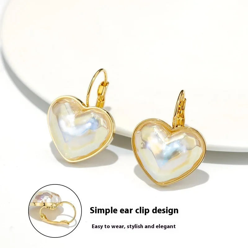 Gold-coloured clip-on earrings with natural style design for women