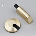 Modern invisible zinc alloy door stopper in six colour finishes on a wall.