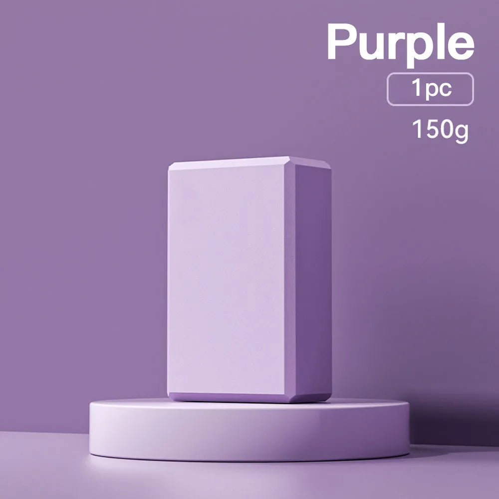 Solid colour EVA foam yoga block measuring 23x15x7.6cm with textured ridges for grip