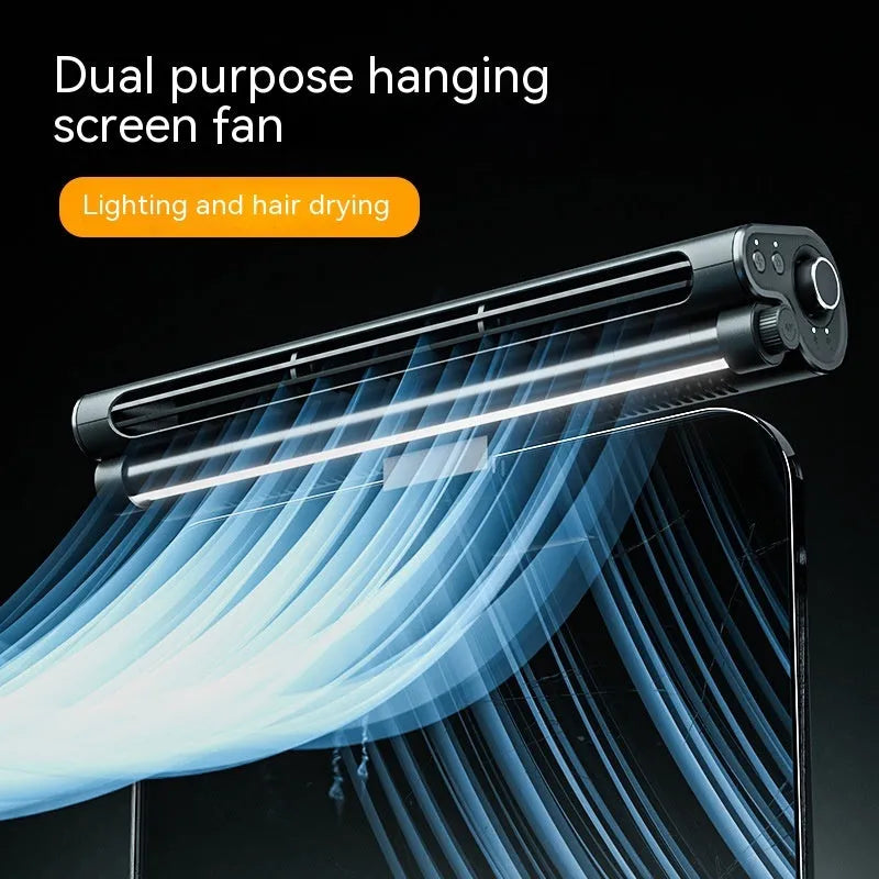 Black clip-on bladeless USB fan attached to laptop screen with LED light illuminated