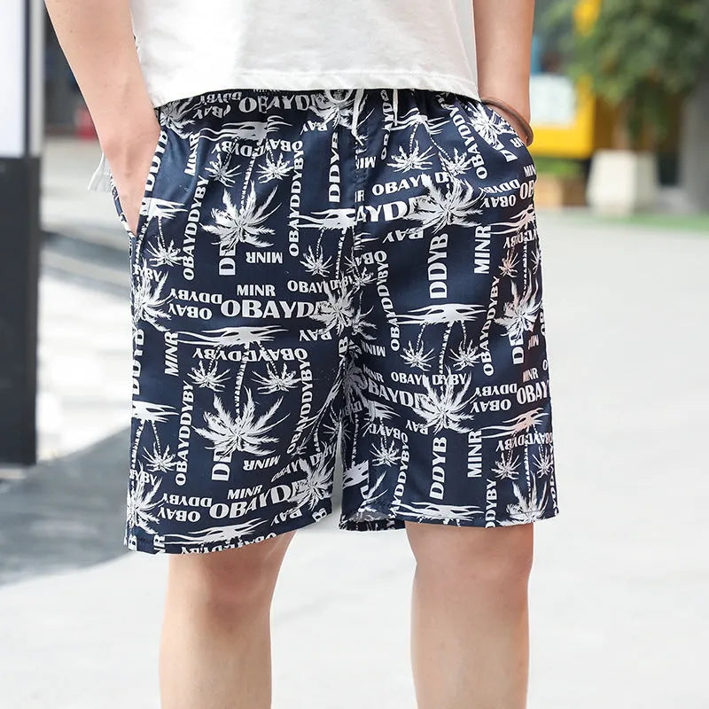 Men's floral print swimming trunks in multiple colour variations for pool and beach wear