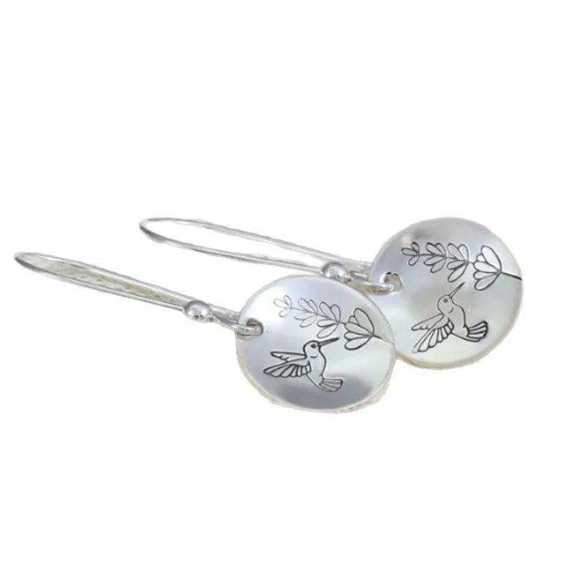 Glossy silver round women's earrings with retro bird and flower design