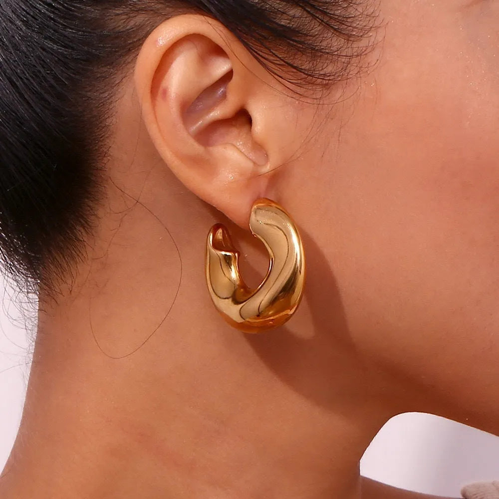 Women's stainless steel geometric hollow irregular line earrings in gold