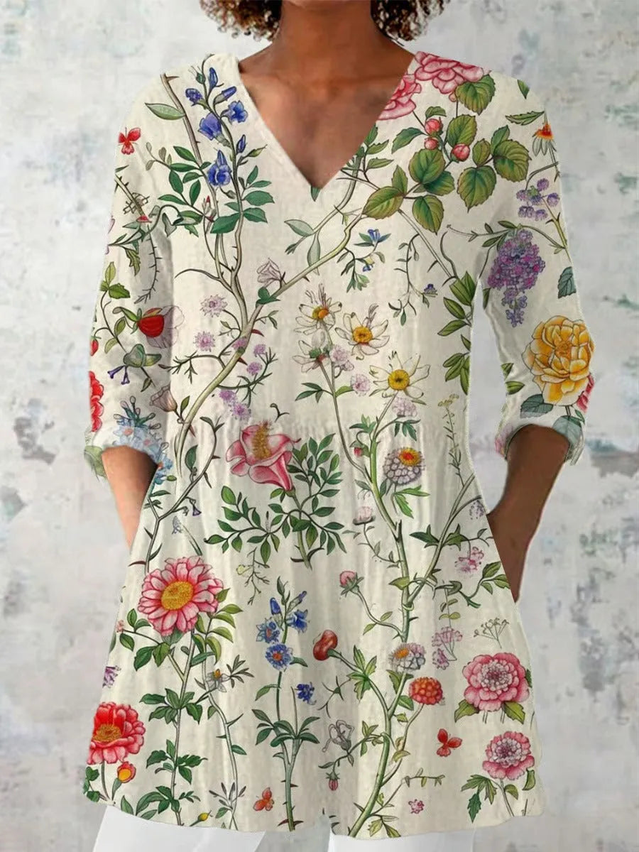 Women's retro slim fit printed long-sleeved polyester top on a hanger, showing digital print design.