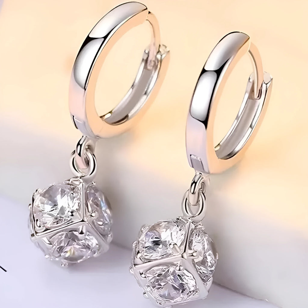 Geometric rose detail zircon earrings for women in copper, available in multiple colours.