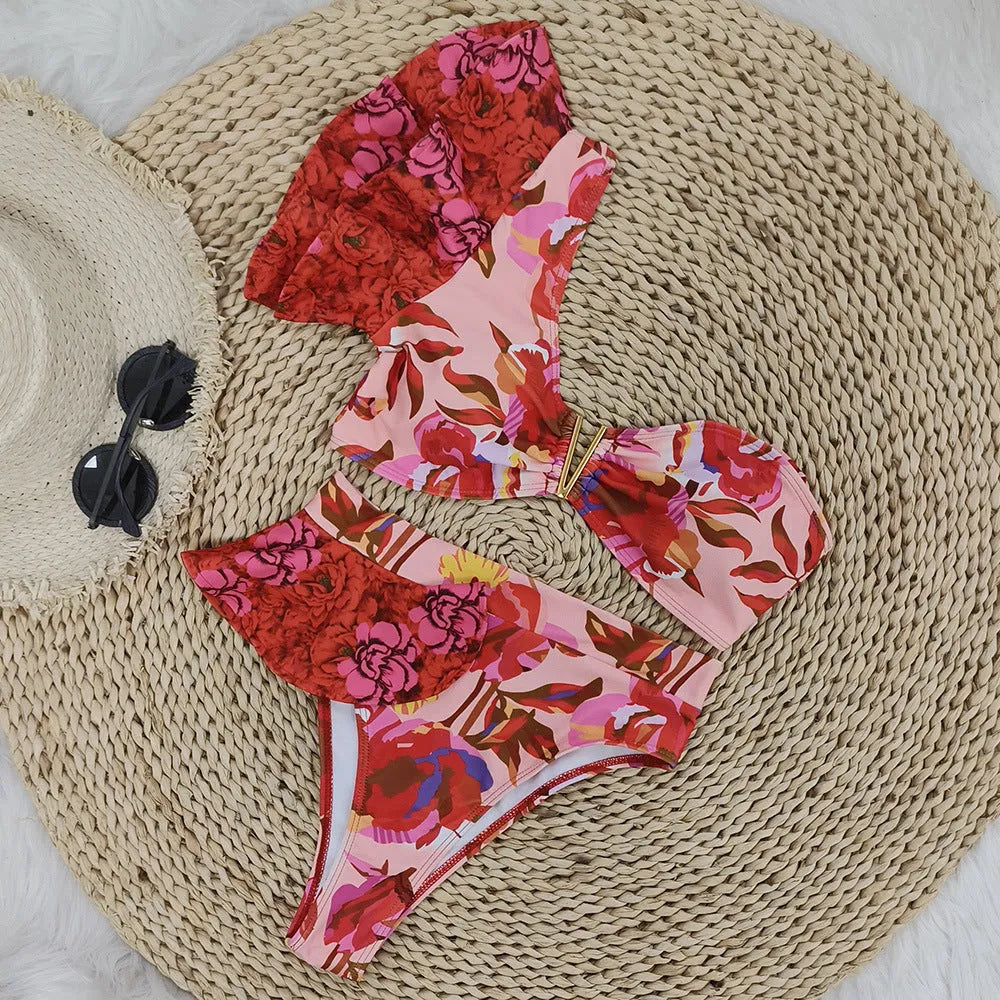 Women's one-shoulder ruffled floral print bikini with high-waist briefs in pink and red colours