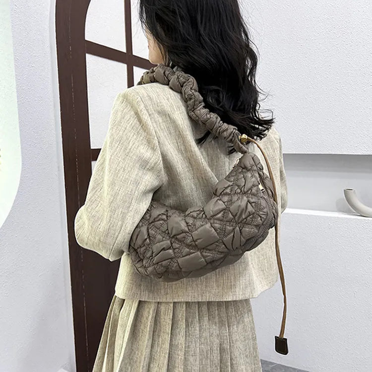 Women's nylon shoulder messenger bag in beige colour showing adjustable strap and dimensions
