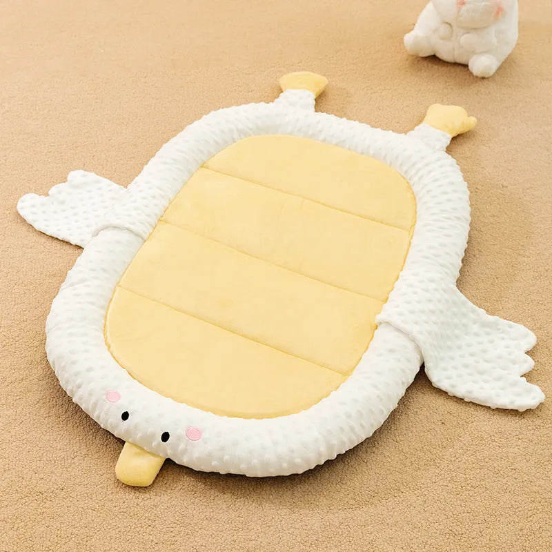 Grey waterproof orthopedic dog bed with supportive foam filling on wooden floor