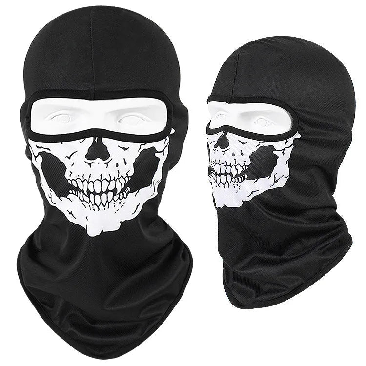 Breathable Bakool silk motorcycle skull mask in a graphic design, laid flat showing its 36cm by 29cm size.