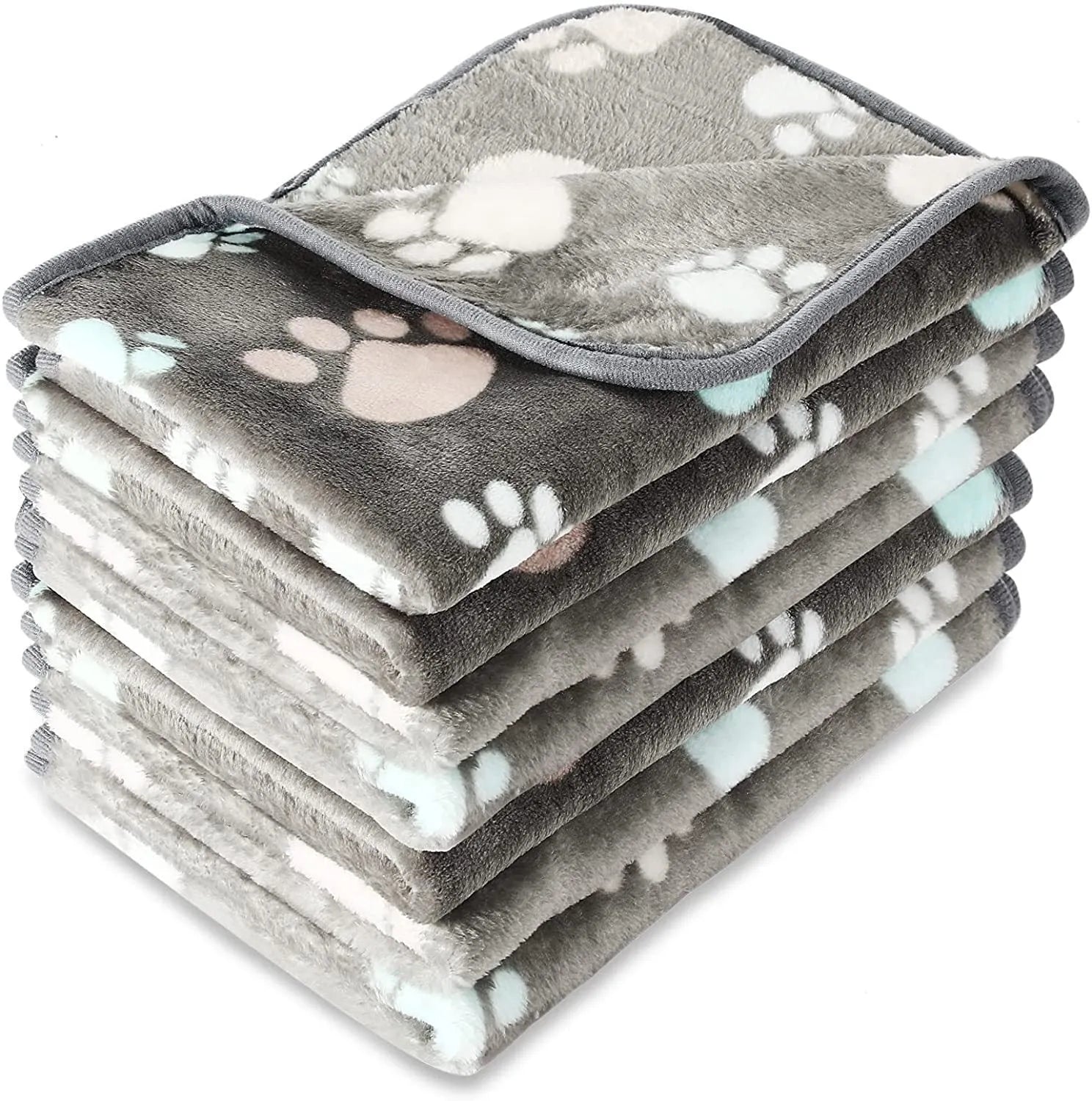 Coral fleece dog blanket with paw print design, shown in camel colour, laid flat.