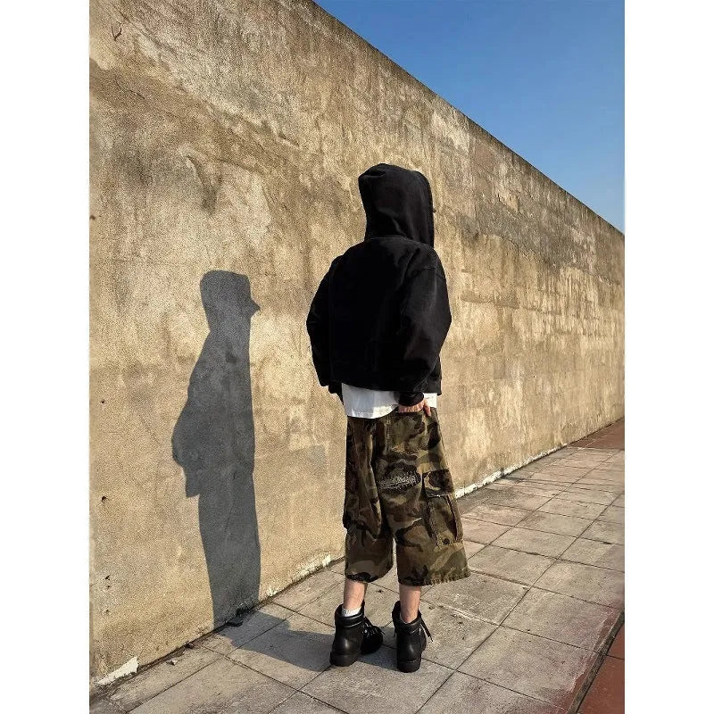 Men's camouflage cropped jeans with retro patches and ripped detailing in straight leg cut