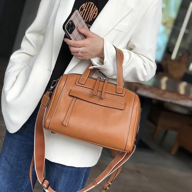 Genuine cowhide leather men's messenger bag in horizontal square shape with lychee pattern.