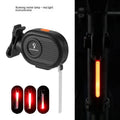 Bicycle rear safety taillight displaying a colourful running water or waterfall light effect on a black background.