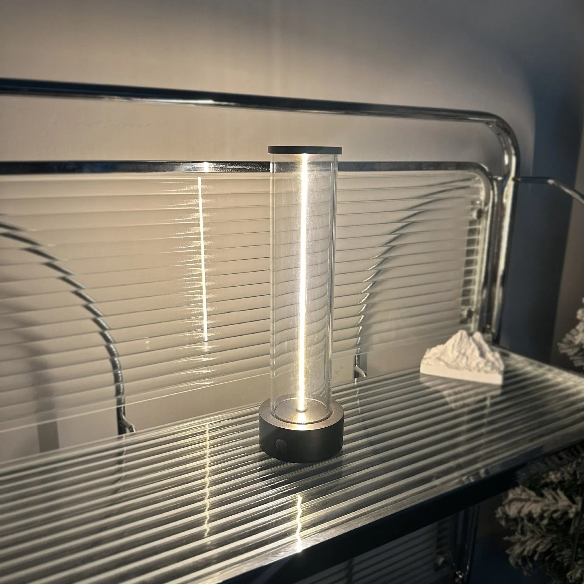 Modern white glass LED line light with magnetic base for USB rechargeable accent lighting
