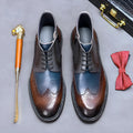 Men's curry blue leather brogue boots with carved detailing and colour blocking