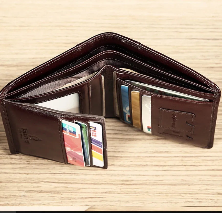 Men's leather wallet showing internal organisation compartments for cards, cash and coins