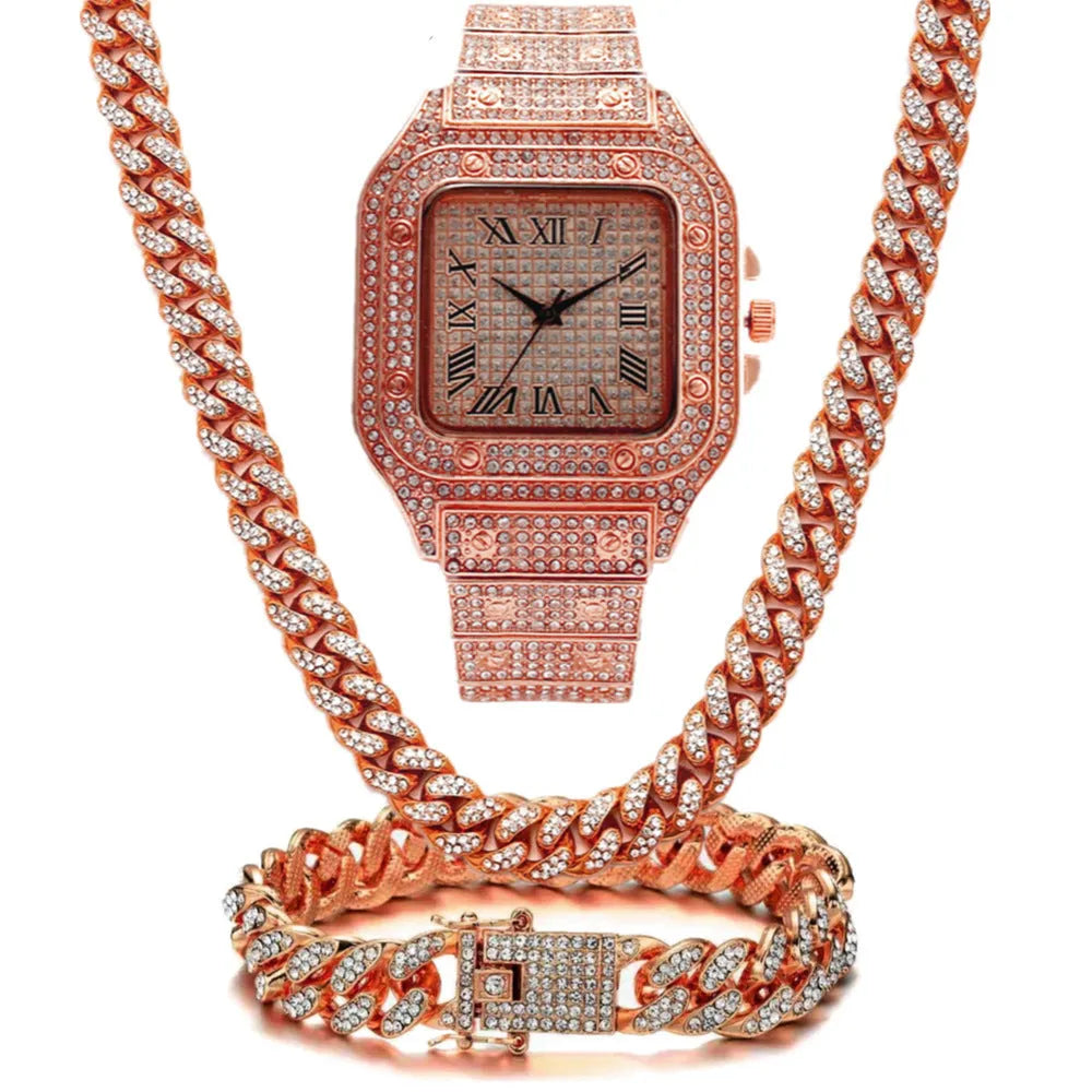 Gold Roman numeral square watch with diamond studs on a mesh band, plus bracelet and necklace.