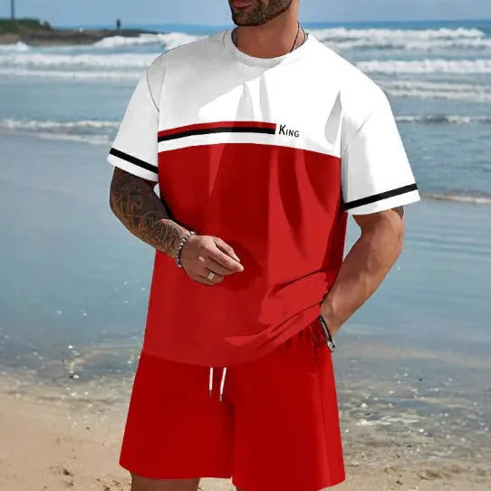 Man wearing a loose light blue short-sleeved T-shirt and matching shorts from a summer leisure suit set.