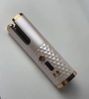 White portable mini curling iron with USB charging cable and gold ceramic barrel.