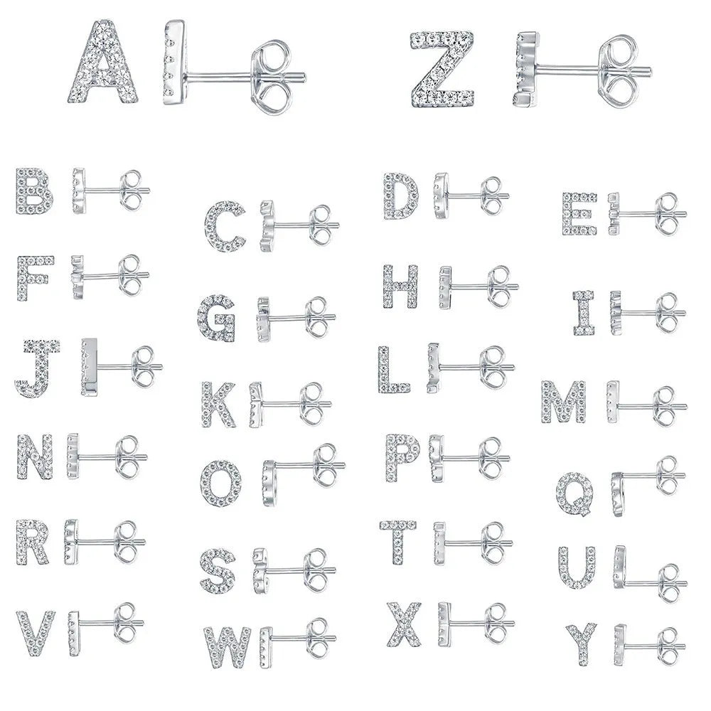 Gold-plated brass alphabet earring showing a single letter with zircon detail on a copper base.
