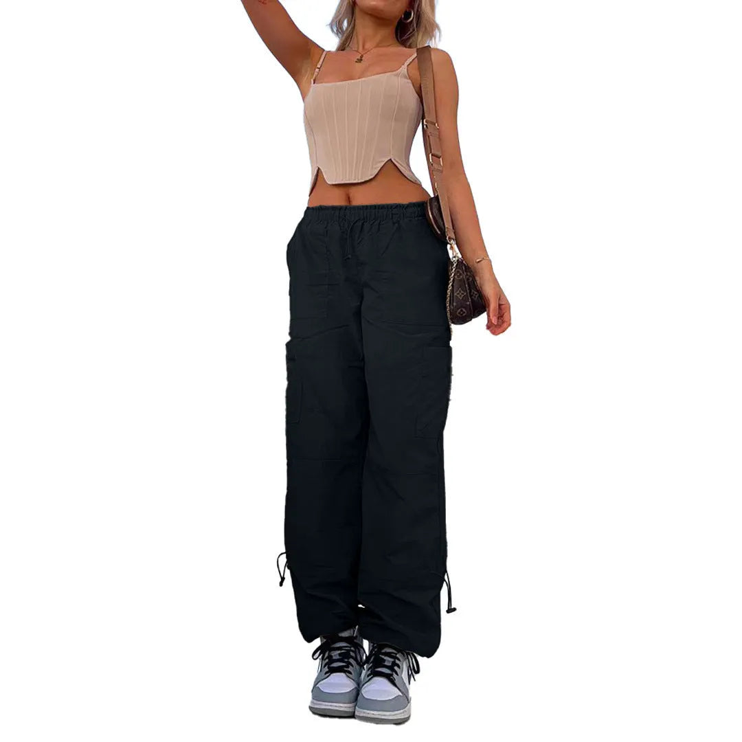 Men's straight-leg cargo trousers in khaki with multiple pockets, showing loose fit and mid-waist design