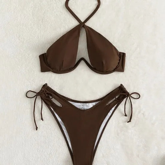 Women's halter neck bikini swimsuit in solid colour with backless design