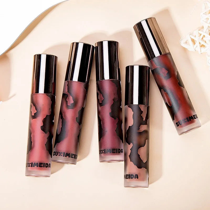 Lava Secret Matte Lip Mud Lipstick tube in one of five colours: orange brown coffee, cool grey, cinnamon coffee, jujube red, or smoked purple.