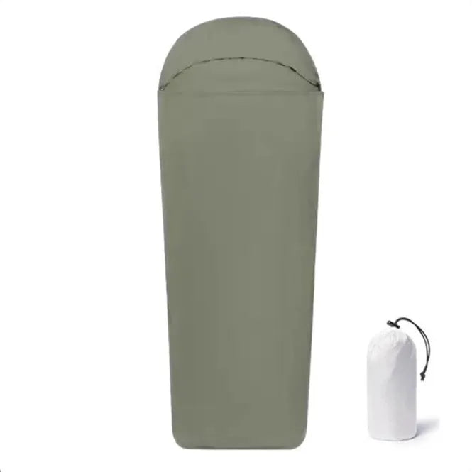 Blue mummy-type nylon camping sleeping bag for adults, laid out flat showing its tapered shape.