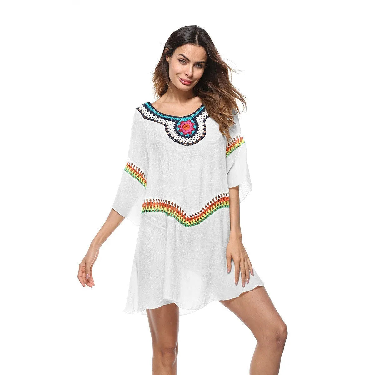 Crocheted ethnic style women's sun protection clothing in apricot colour for beach wear.