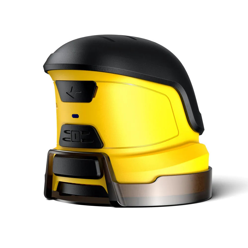 Yellow cordless electric ice scraper with USB charging cable on a car windscreen.