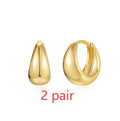 Golden electroplated brass earclip earrings with geometric round design