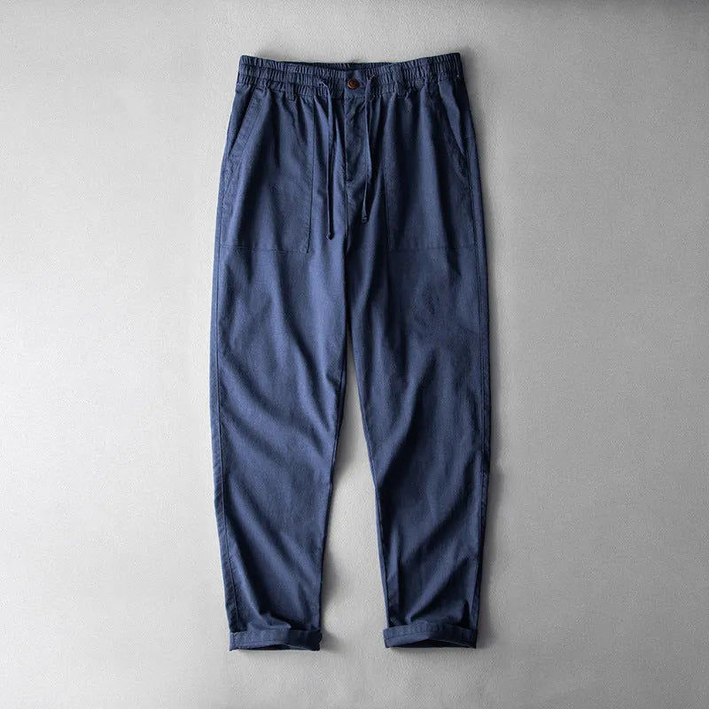 Men's linen trousers in solid colour with mid waist design for casual leisure wear