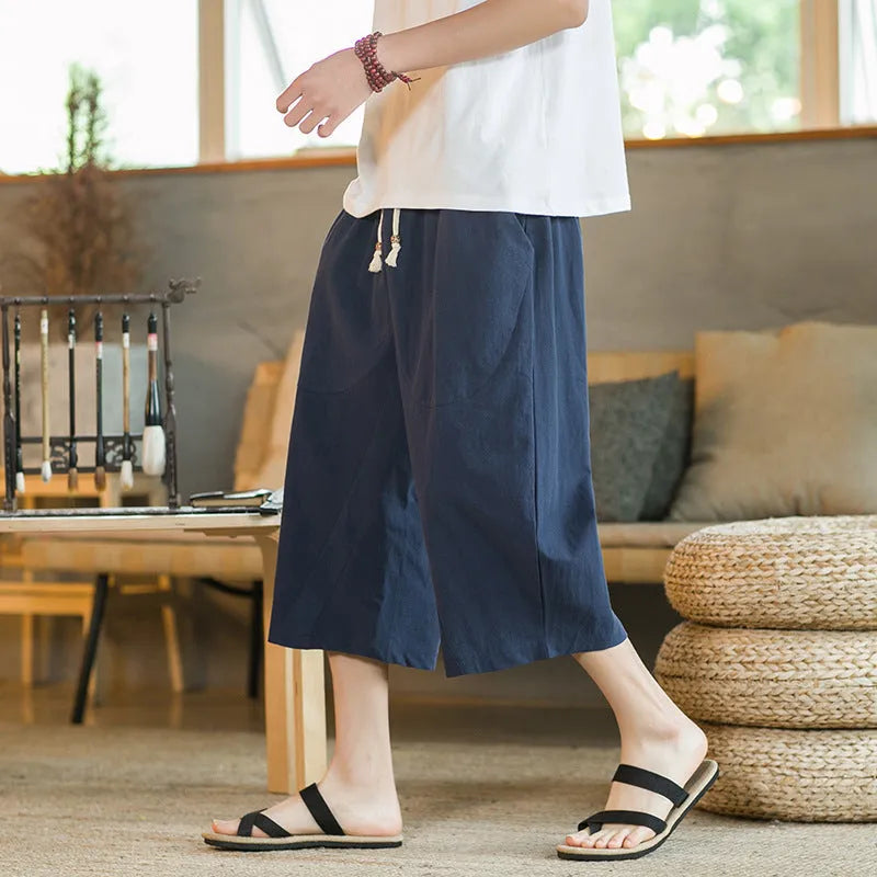 Straight cut linen summer shorts in khaki colour shown on hanger